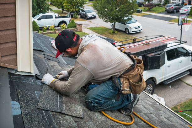 Professional Flat Roof Repair technician working in Petoskey, MI
